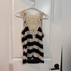 Free kisses brand women’s size Large black and white striped tank top